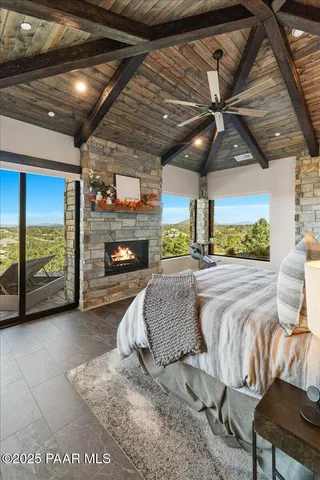 an aerial view of a house with a ocean view