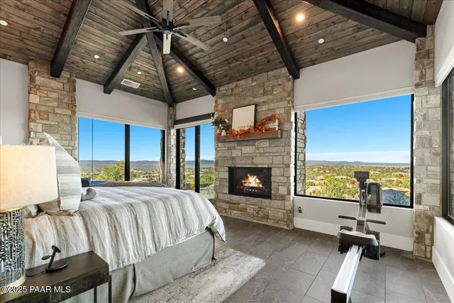 a view of a house with a yard and ocean view