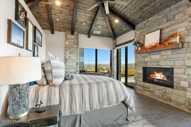 a building outdoor space with patio furniture and potted plants