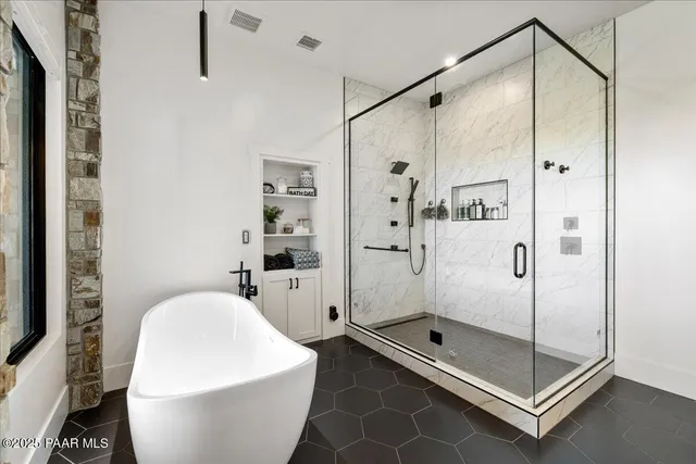 a outdoor living space with furniture and a potted plant