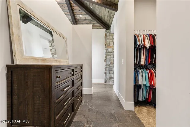 a living room with fireplace furniture and a flat screen tv