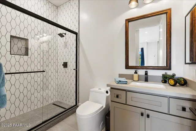 a bed room with a bed and a fireplace