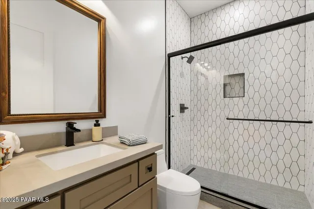 a view of living room and porch with furniture