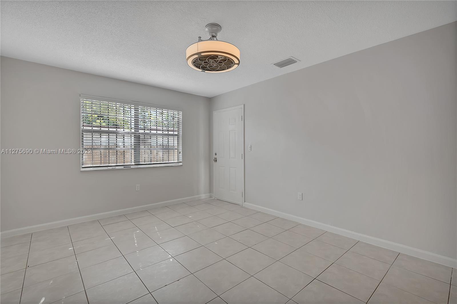 Allapattah Miami, FL 33142 - Photo 13 of 31 an empty room with windows