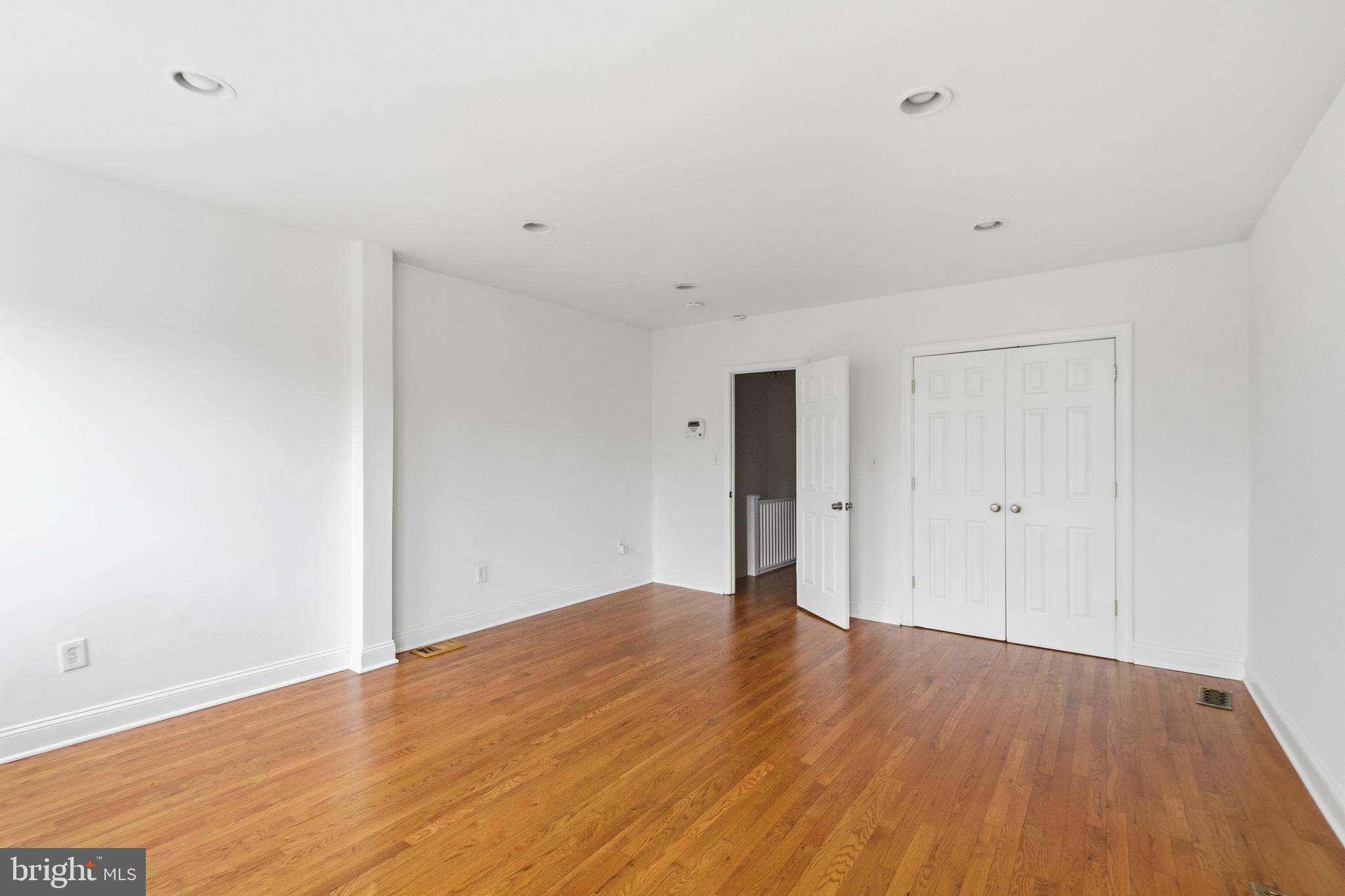 440 Delafield Place Northwest Washington, DC 20011 - Photo 20 of 33 a view of an empty room with wooden floor