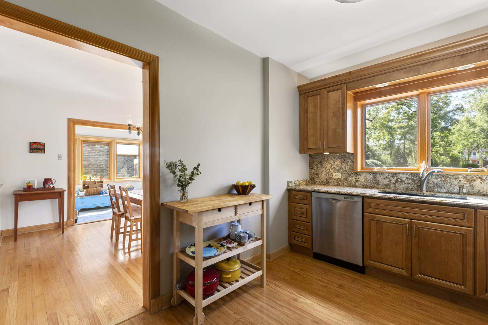 404 Selborne Road Riverside, IL 60546 - Photo 15 of 26 a kitchen with stainless steel appliances granite countertop a stove and a wooden floors