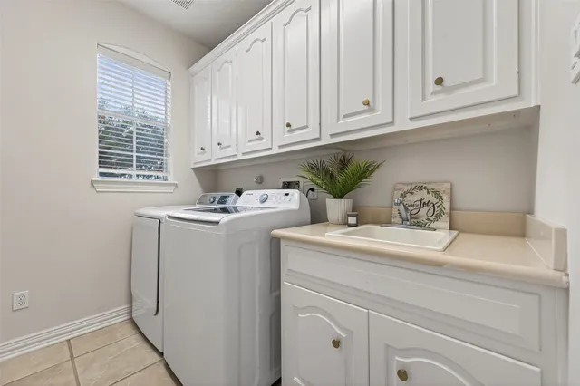 a kitchen with stainless steel appliances granite countertop a stove and a microwave
