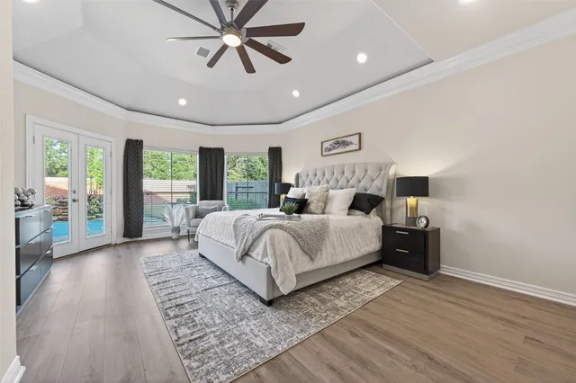 a view of a room with wooden floor