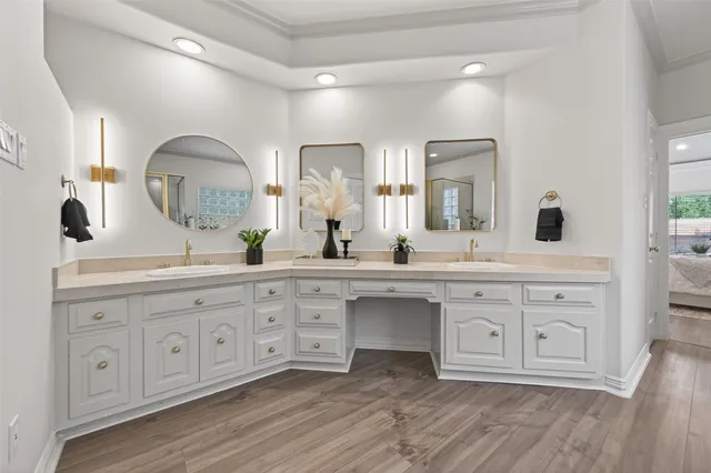 a living room with furniture a floor to ceiling window and potted plant