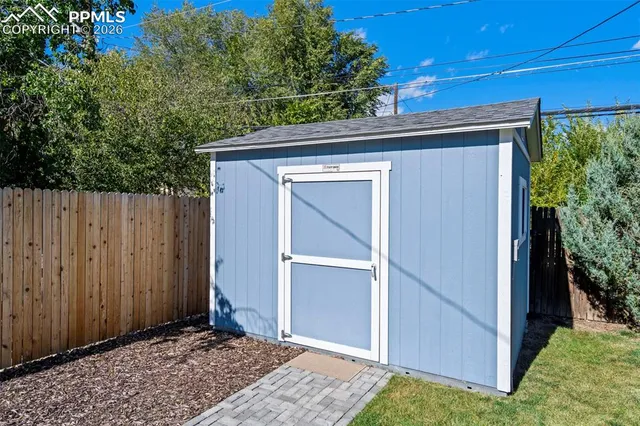 a view of a garden with a slide