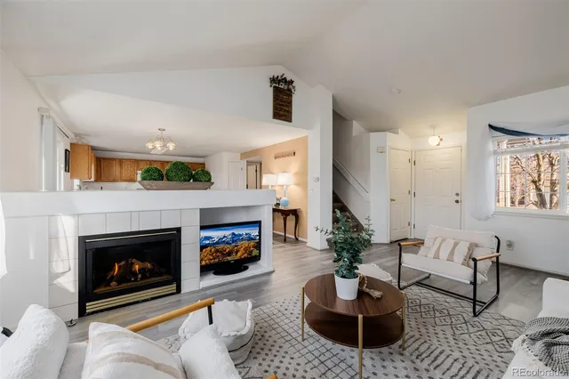 a kitchen with a table and chairs in it