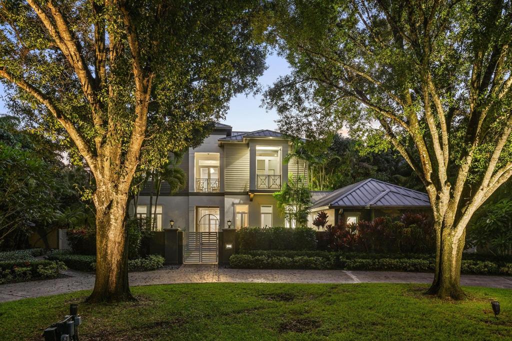 101 Holly Lane Plantation, FL 33317 - Photo 1 of 59 a front view of a house with a yard