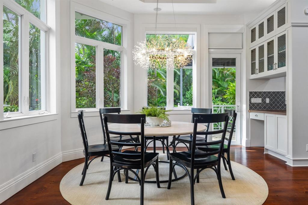 101 Holly Lane Plantation, FL 33317 - Photo 16 of 59 a view of a dining room with furniture window and wooden floor
