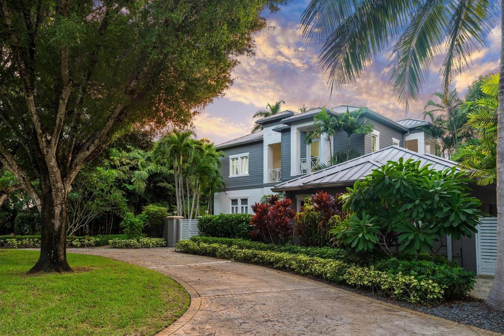 101 Holly Lane Plantation, FL 33317 - Photo 2 of 59 front view of a house with a garden