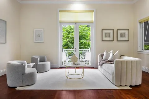 a bathroom with a granite countertop shower