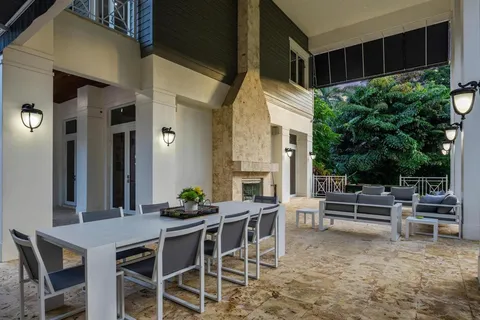 a view of a swimming pool with a patio