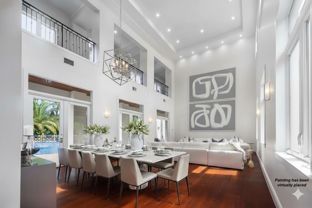 101 Holly Lane Plantation, FL 33317 - Photo 7 of 59 a view of a dining room with furniture window and wooden floor