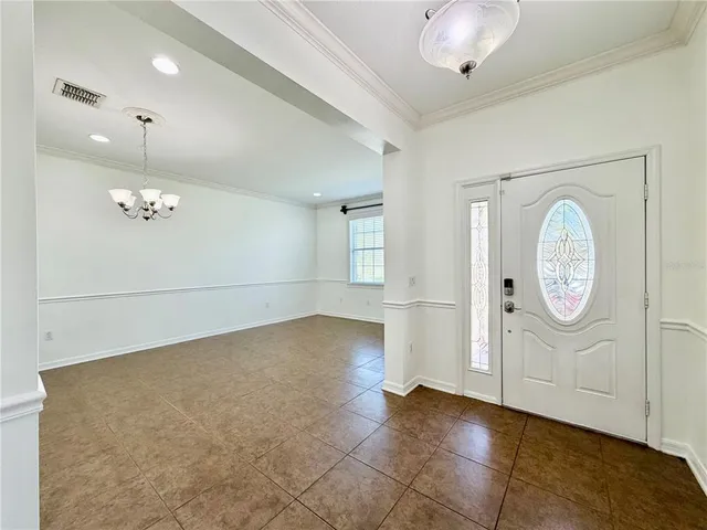 a white toilet sitting next to a white sink