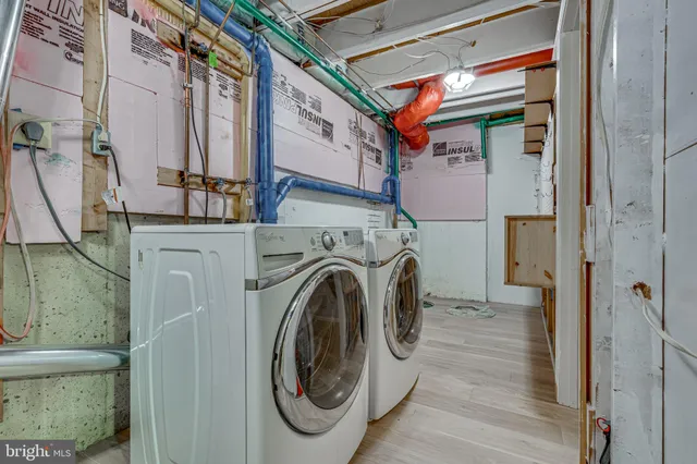 a utility room with dryer and washer