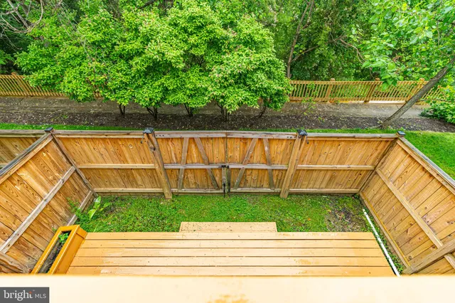 a view of swimming pool with a backyard