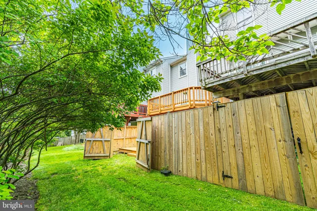 a view of backyard with green space