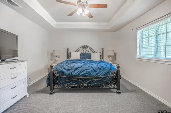 a living room with furniture and white walls