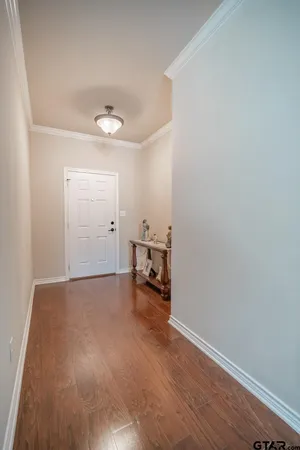a living room with a fireplace and furniture