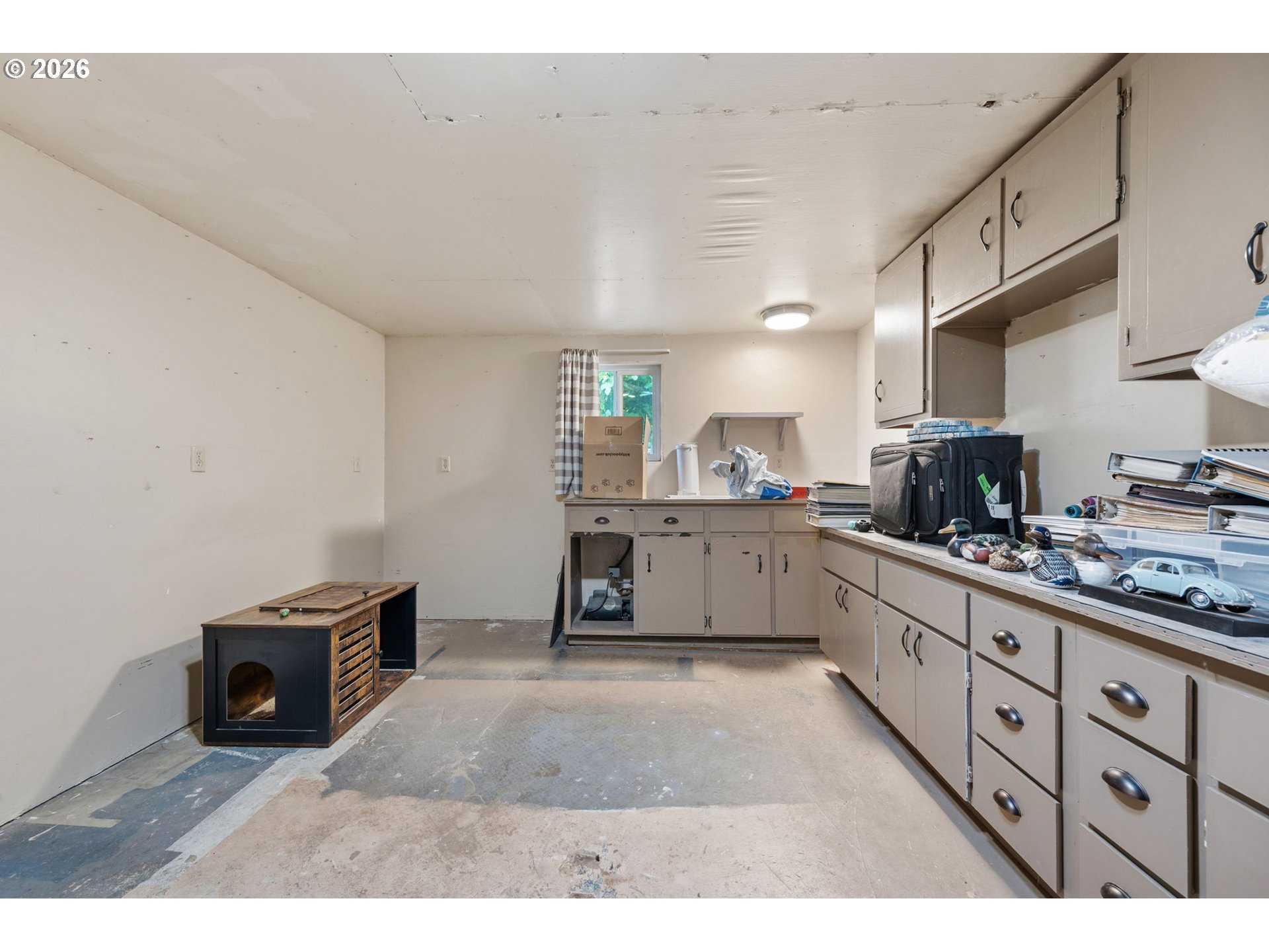 2936 Game Farm Road Springfield, OR 97477 - Photo 18 of 25 a kitchen with stainless steel appliances kitchen island granite countertop a stove a sink and a microwave