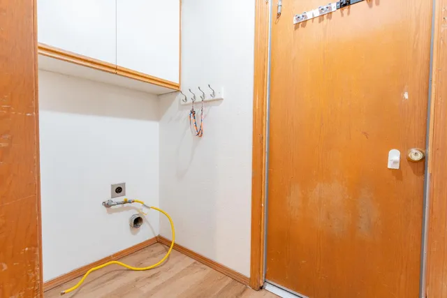 a bathroom with a tub and shower