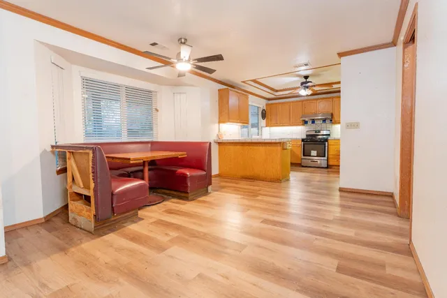 a room with furniture and wooden floor
