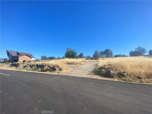 a view of a road near an ocean