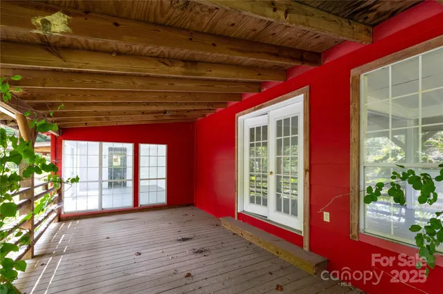a view of outdoor space with wooden fence
