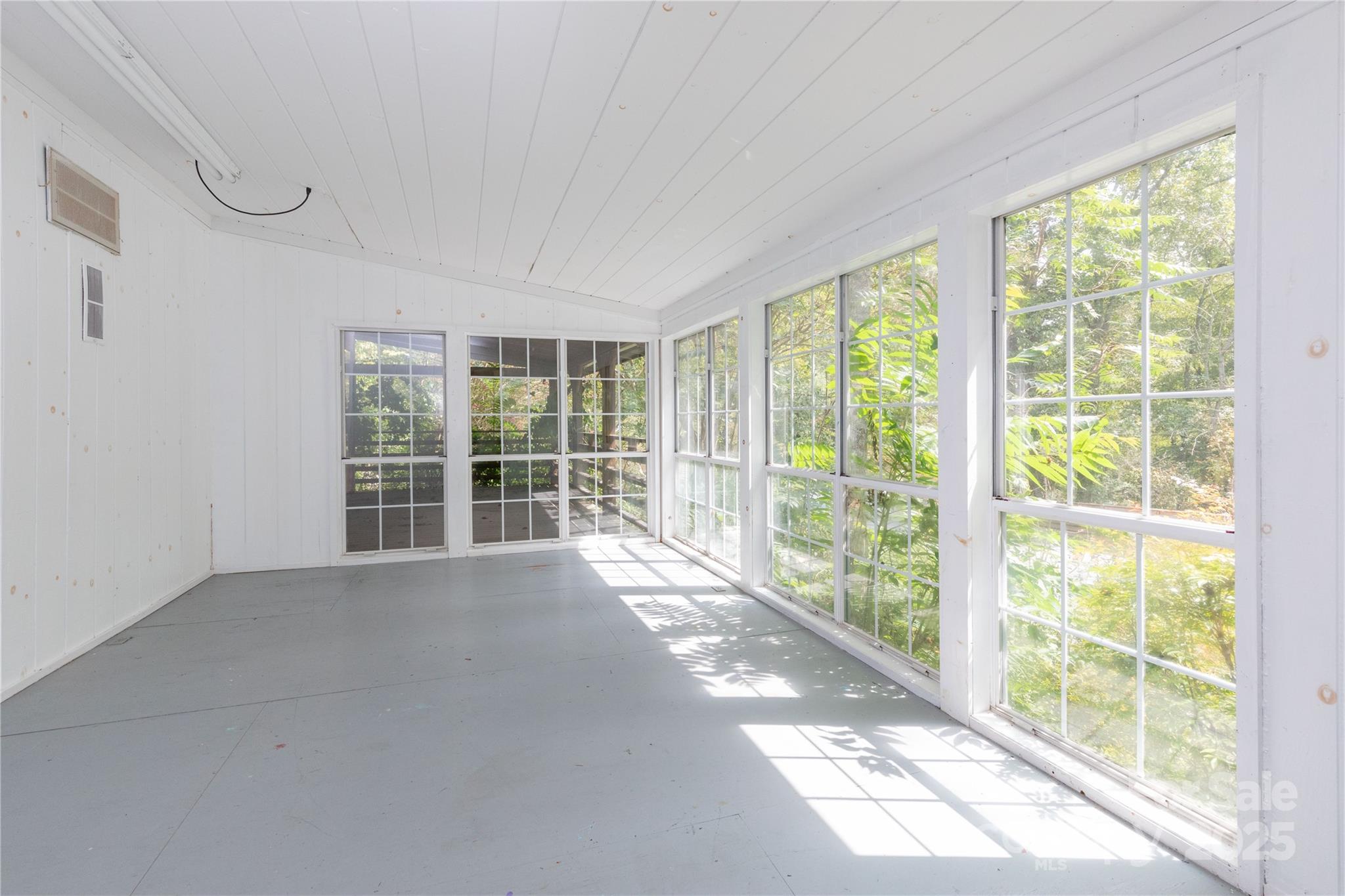 3290 Gerton Highway Gerton, NC 28735 - Photo 23 of 36 a view of an empty room with a large window