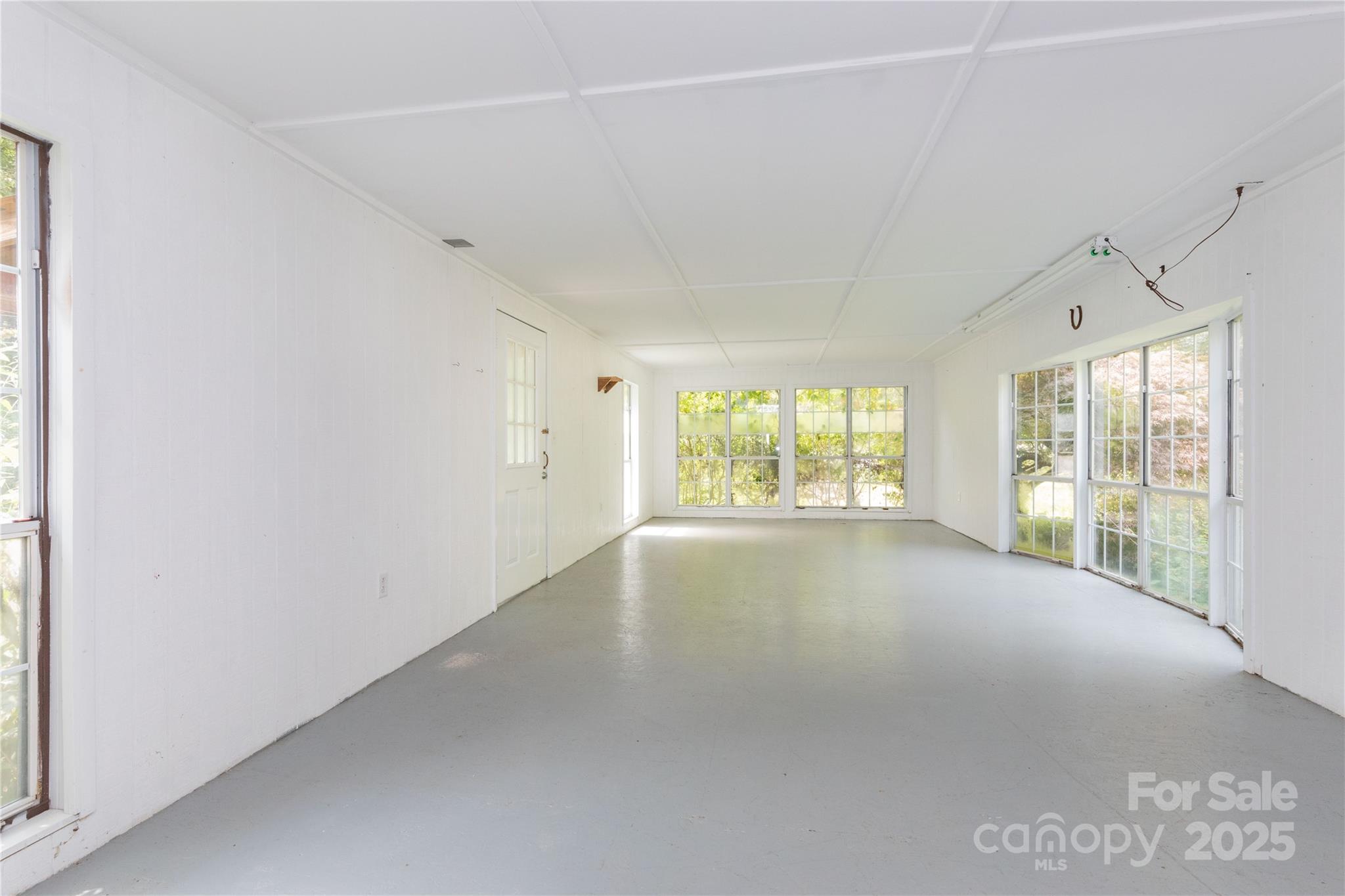 3290 Gerton Highway Gerton, NC 28735 - Photo 25 of 36 a view of an empty room with a window