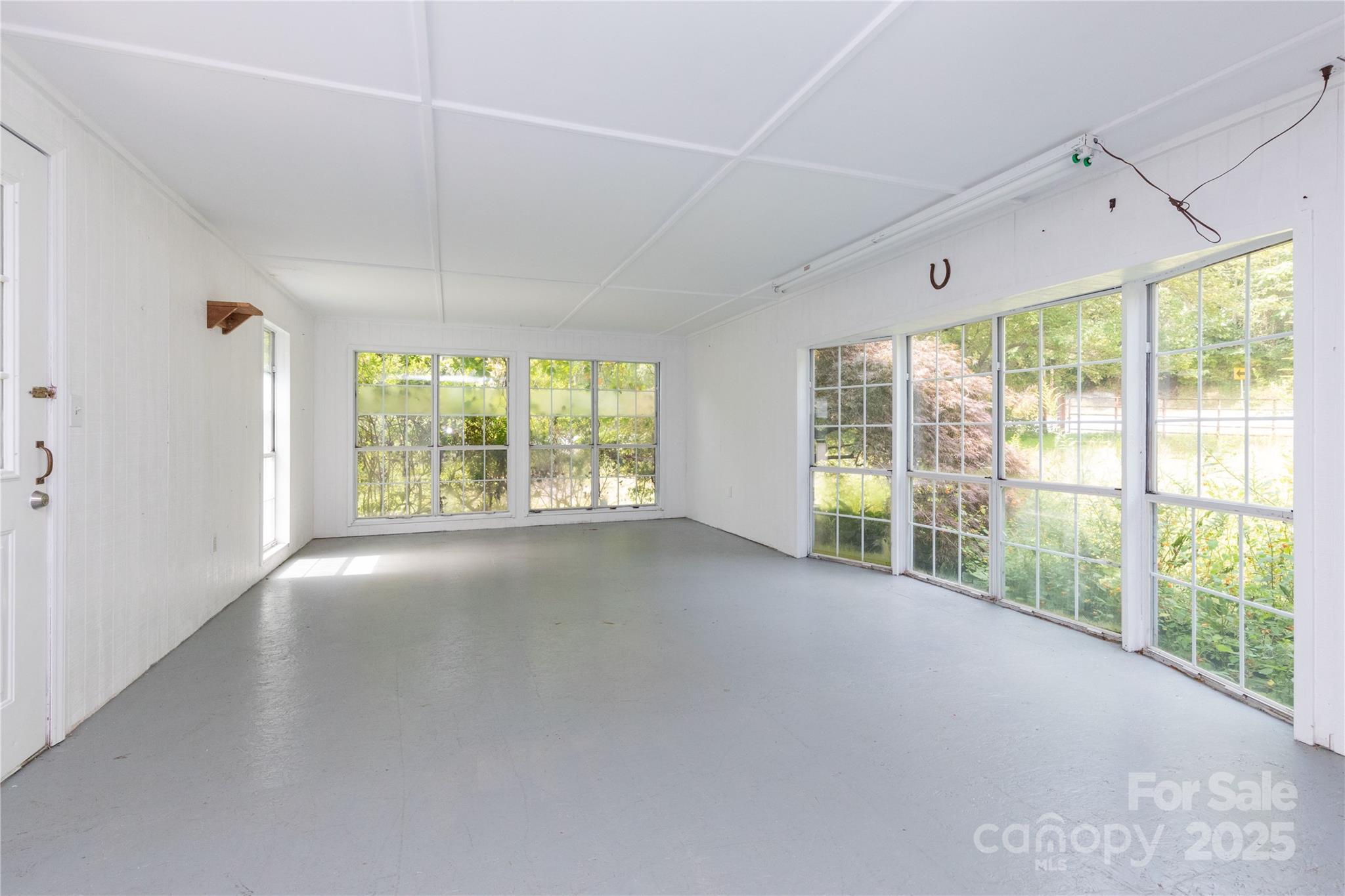3290 Gerton Highway Gerton, NC 28735 - Photo 26 of 36 a view of a big room with windows
