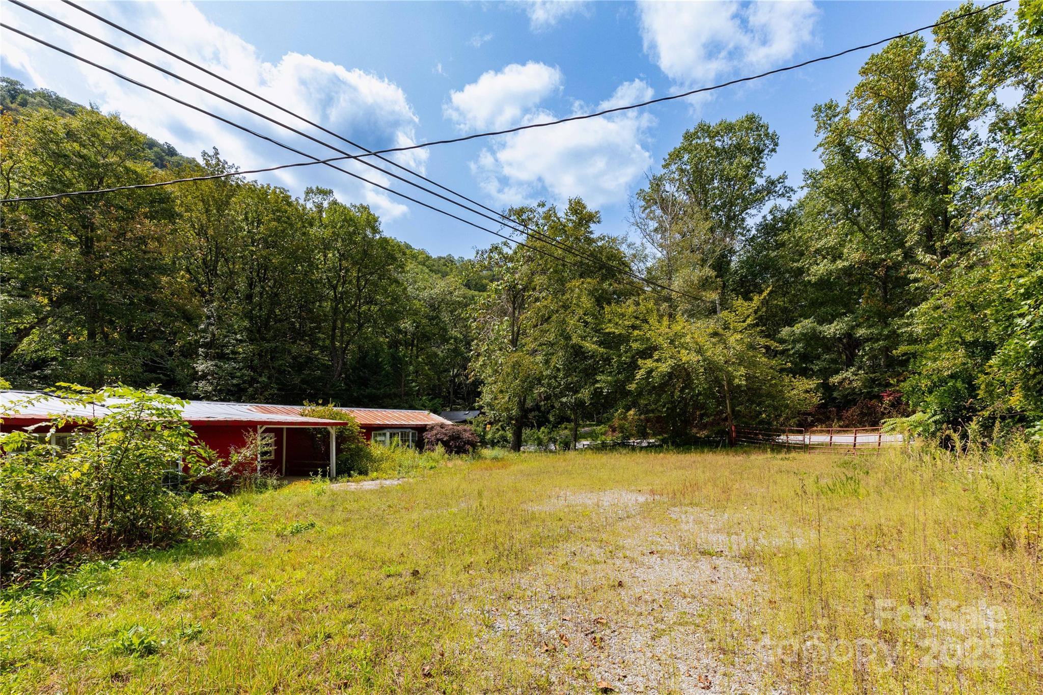 3290 Gerton Highway Gerton, NC 28735 - Photo 5 of 36 a view of a swimming pool with a patio
