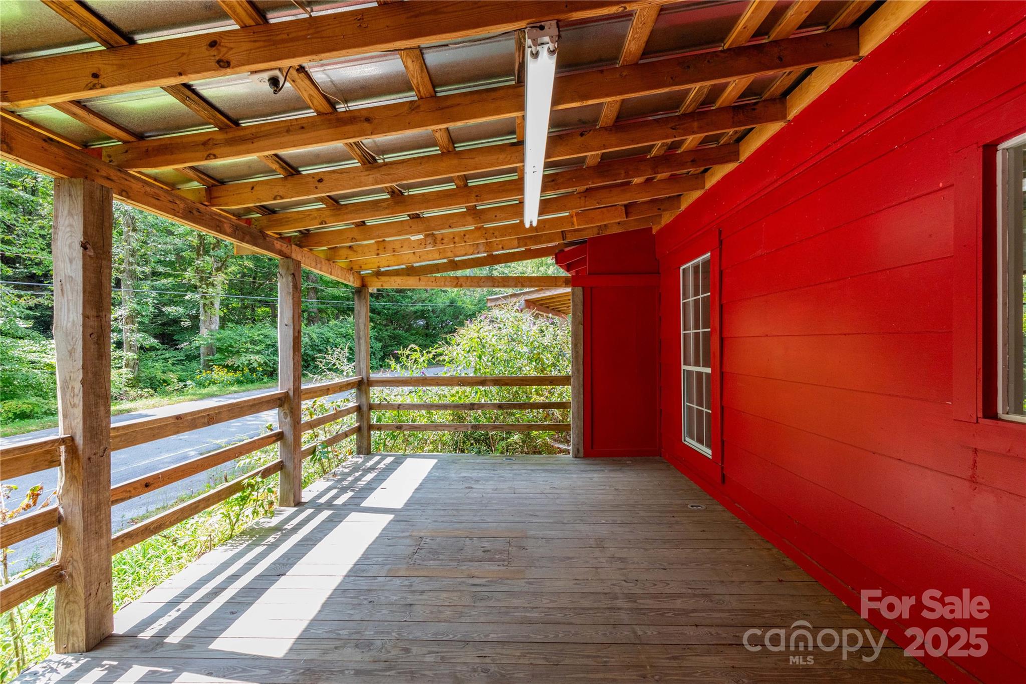 3290 Gerton Highway Gerton, NC 28735 - Photo 8 of 36 a view of porch with a tv