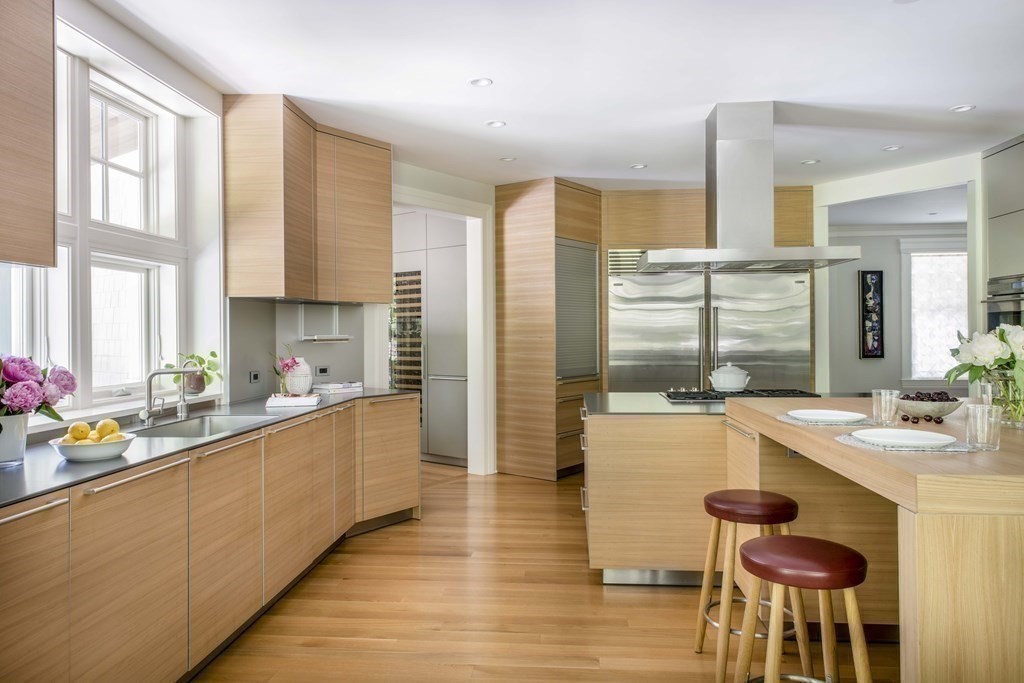 55 Ridge Hill Farm Road Wellesley, MA 02482 - Photo 11 of 32 a large kitchen with a large window and stainless steel appliances