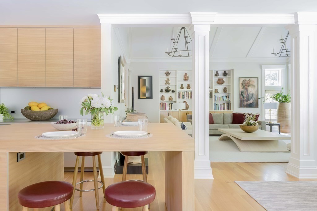 55 Ridge Hill Farm Road Wellesley, MA 02482 - Photo 12 of 32 a view of kitchen island with furniture and wooden floor