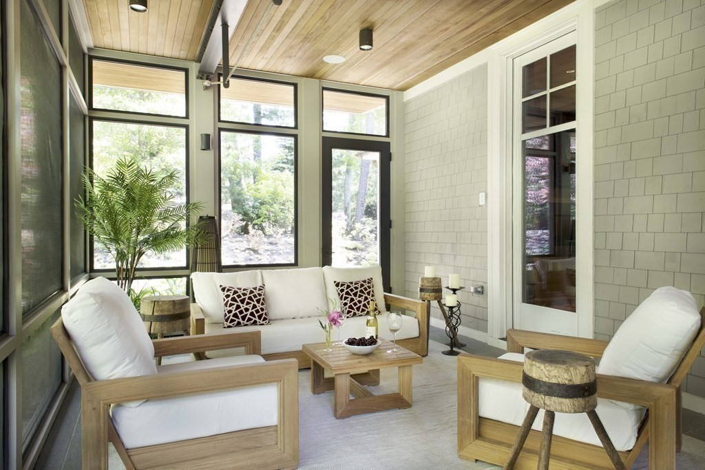 55 Ridge Hill Farm Road Wellesley, MA 02482 - Photo 16 of 32 a living room with furniture and floor to ceiling windows
