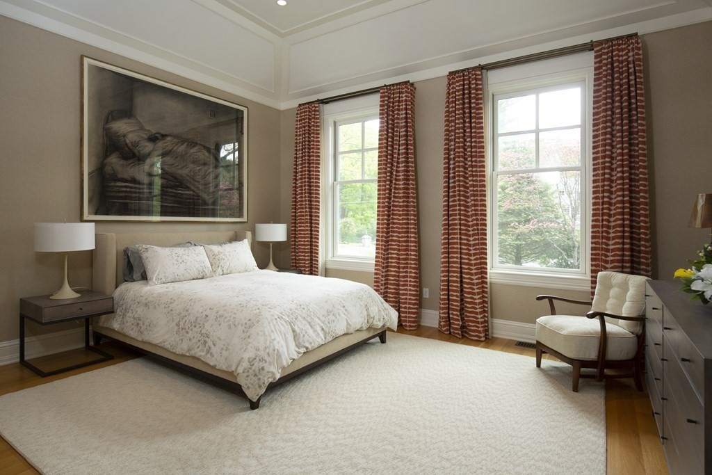 55 Ridge Hill Farm Road Wellesley, MA 02482 - Photo 30 of 32 a bedroom with a bed and glass window