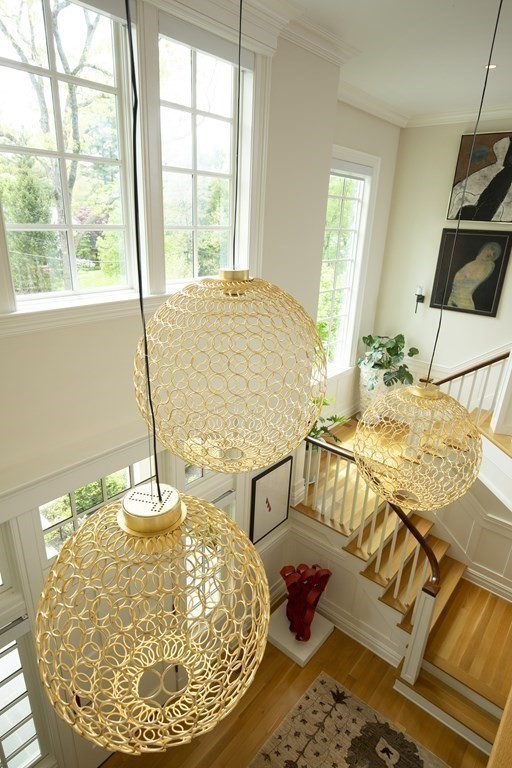 55 Ridge Hill Farm Road Wellesley, MA 02482 - Photo 5 of 32 a living room with a table and chair