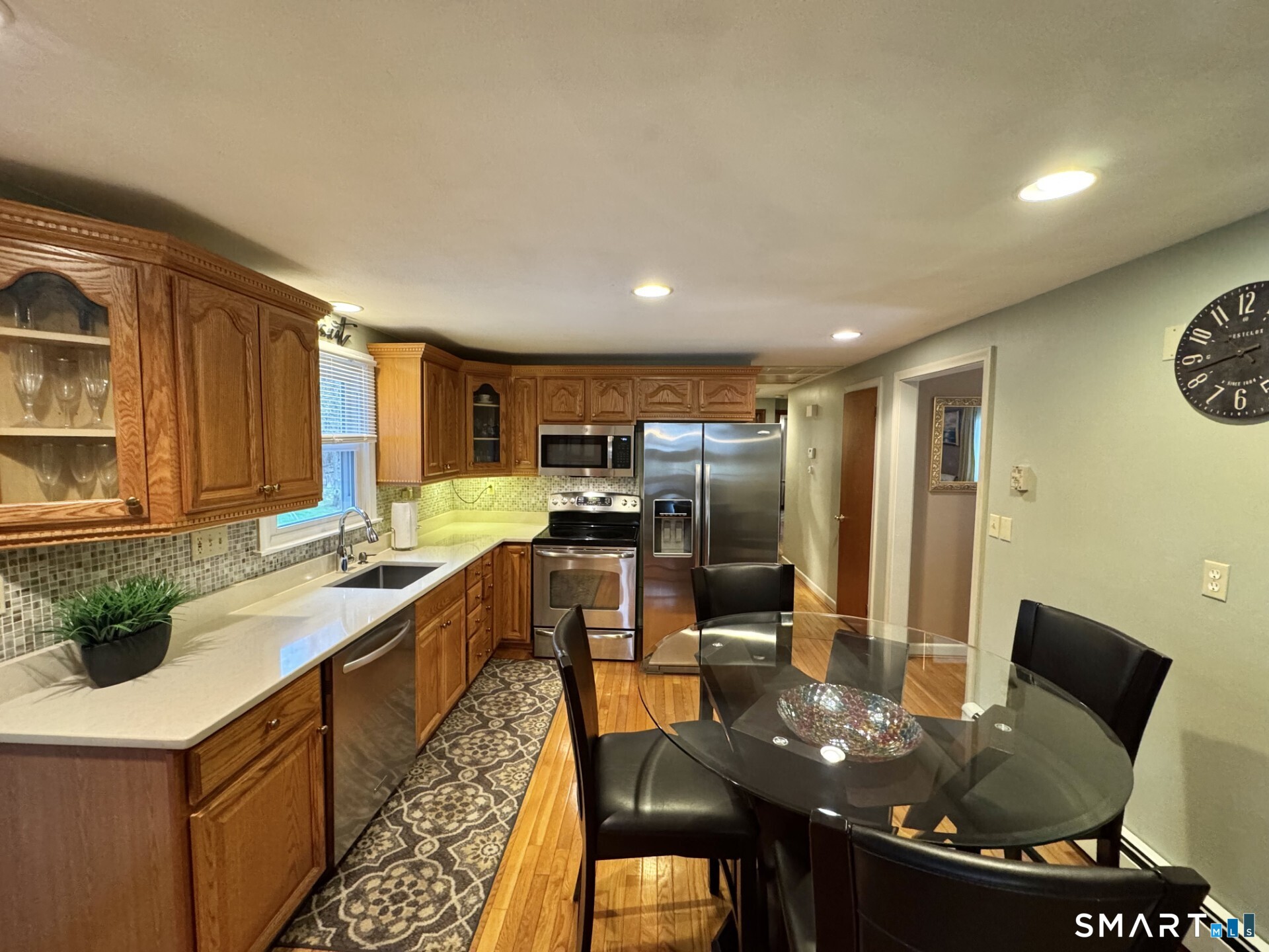 97 Brookview Road Windsor, CT 06095 - Photo 8 of 31 Remodeled kitchen with stainless steel appliances.