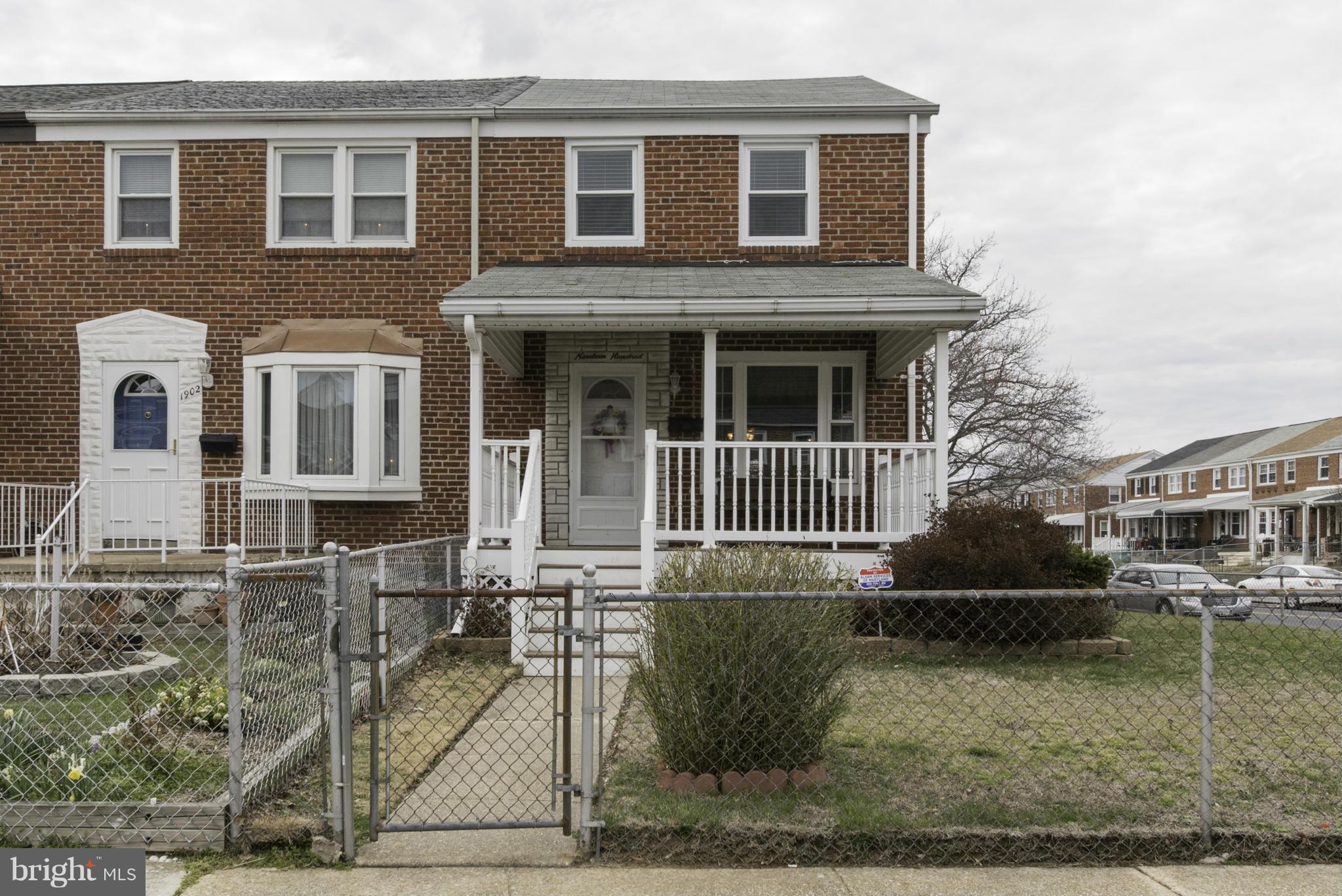 1900 Barry Road Baltimore, MD 21222 - Photo 2 of 30 a front view of a house with garden