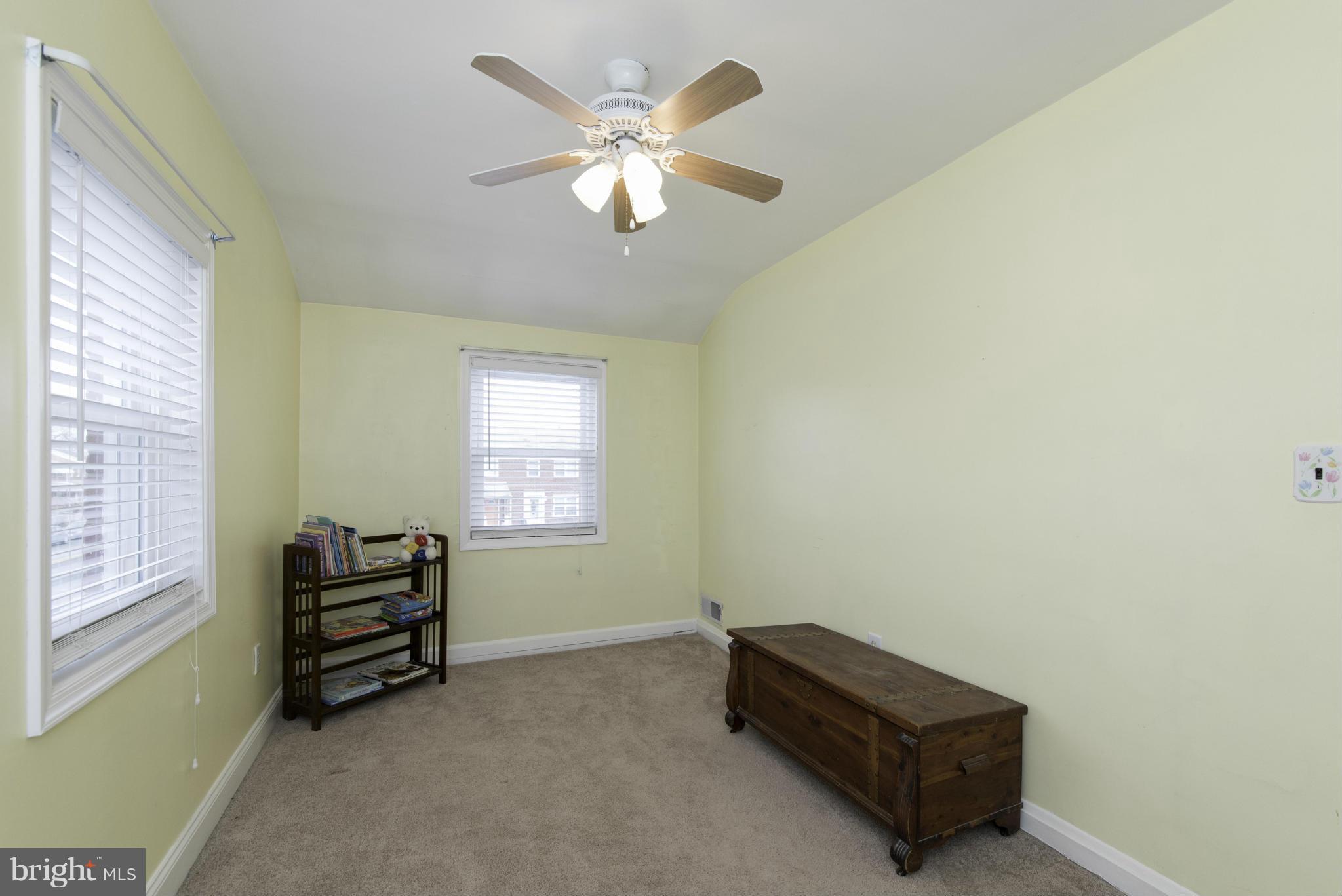 1900 Barry Road Baltimore, MD 21222 - Photo 22 of 30 a room with window and couch