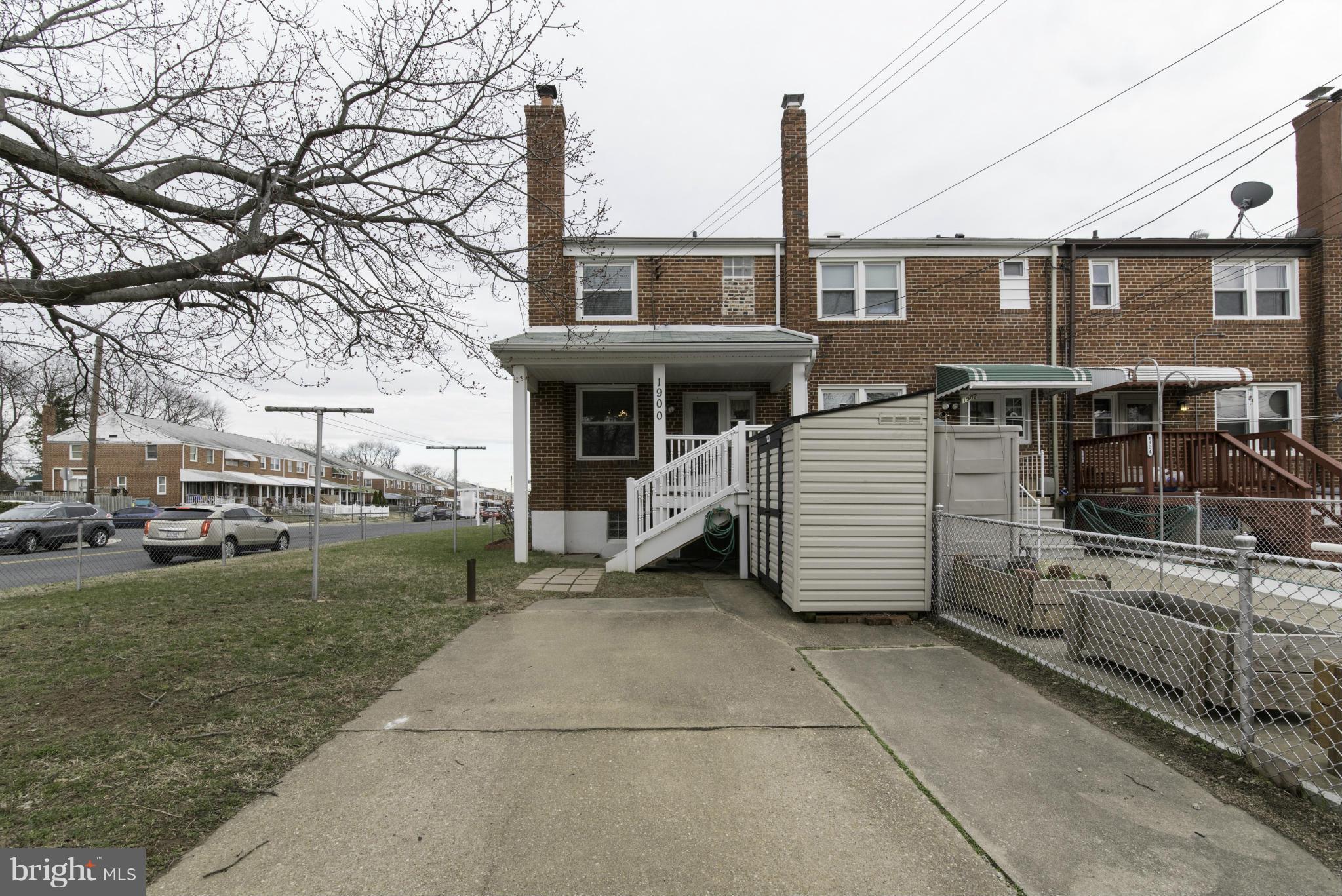 1900 Barry Road Baltimore, MD 21222 - Photo 29 of 30 a view of a house with a yard