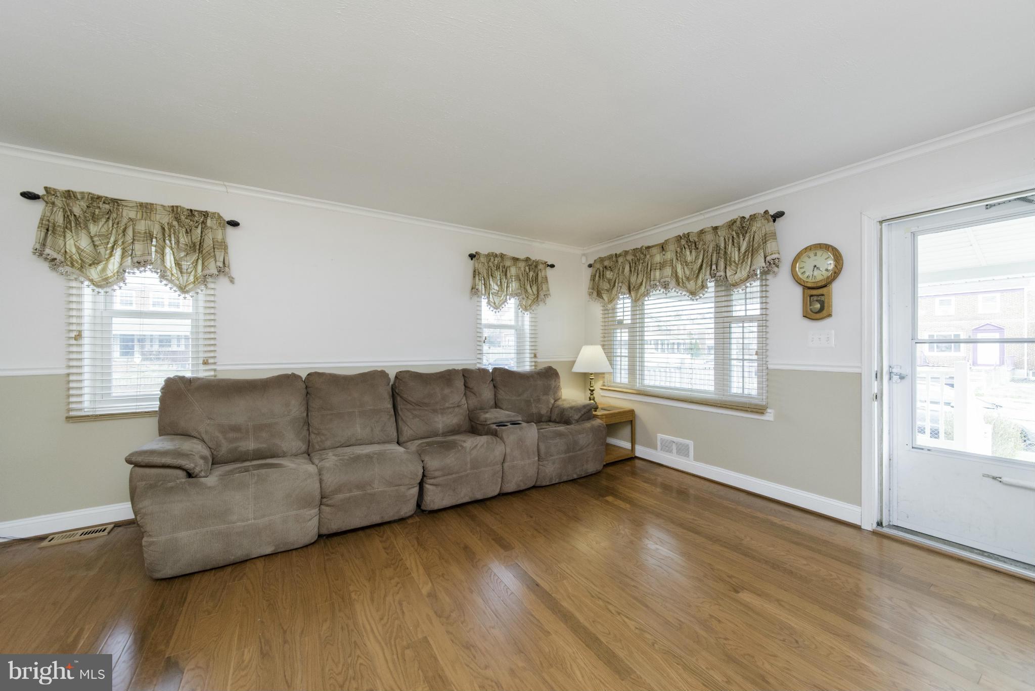 1900 Barry Road Baltimore, MD 21222 - Photo 6 of 30 a living room with furniture and a window