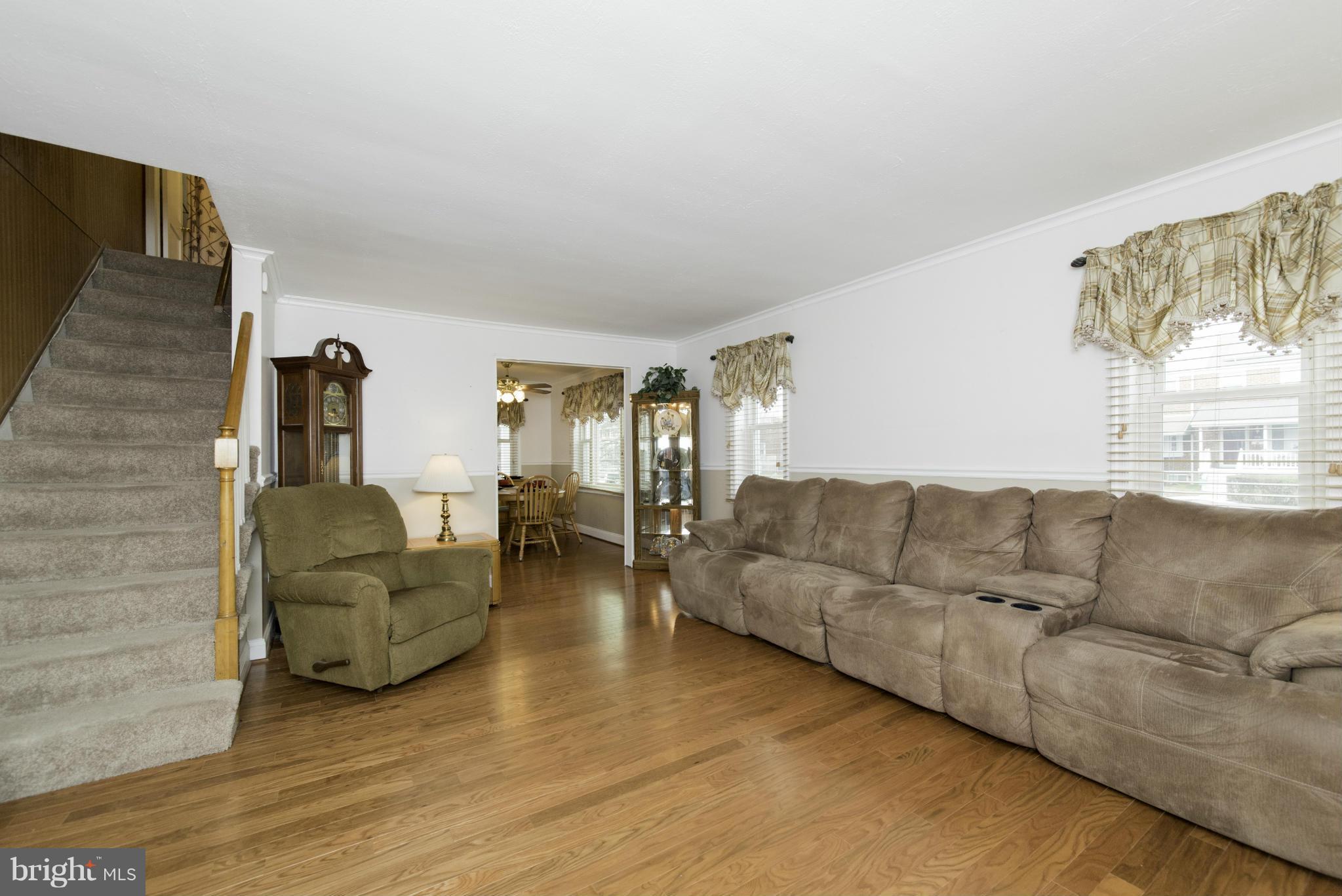 1900 Barry Road Baltimore, MD 21222 - Photo 9 of 30 a living room with furniture and a large window