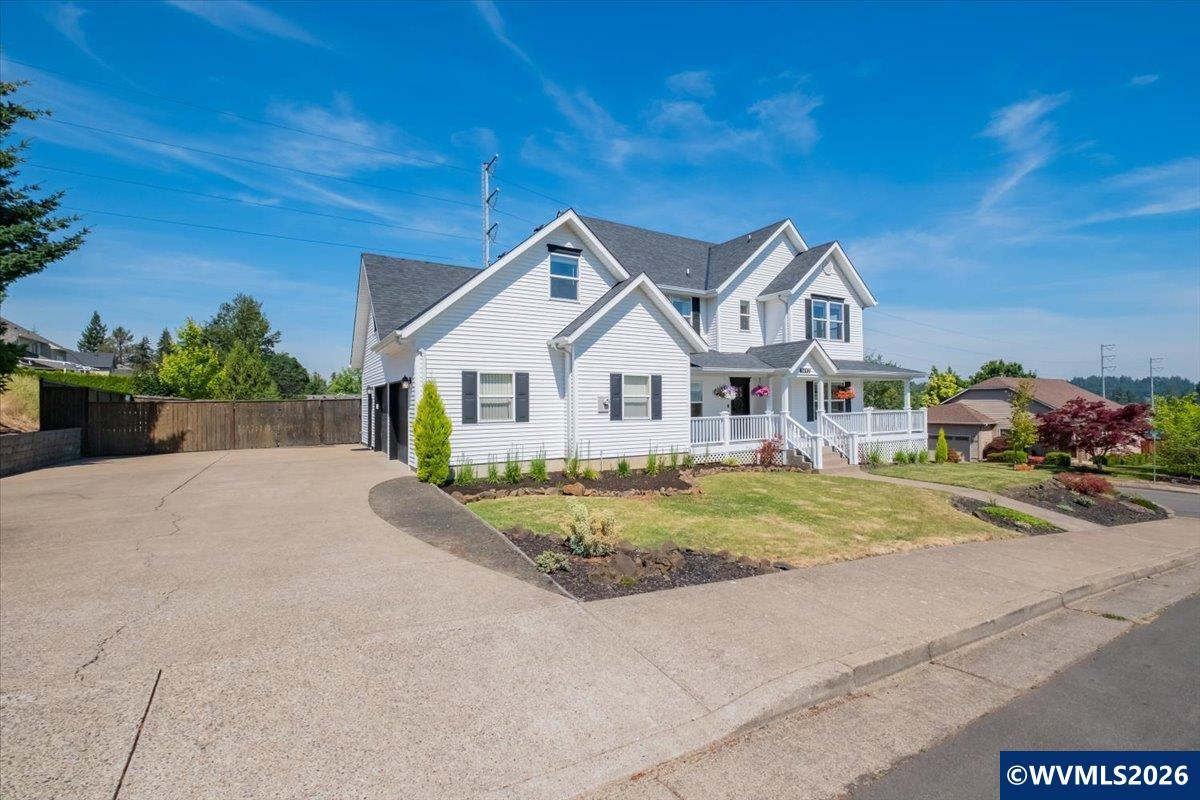 1492 Northwest Penny Lane Albany, OR 97321 - Photo 7 of 50 a front view of a house with a porch