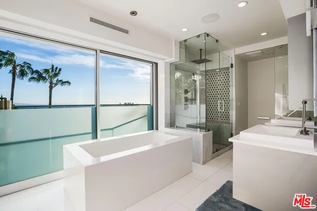 a room with lot of dryer and washer